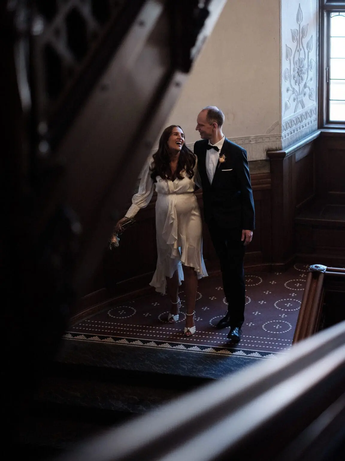 Descending Together - A Moment on the Stairs at Copenhagen City Hall.