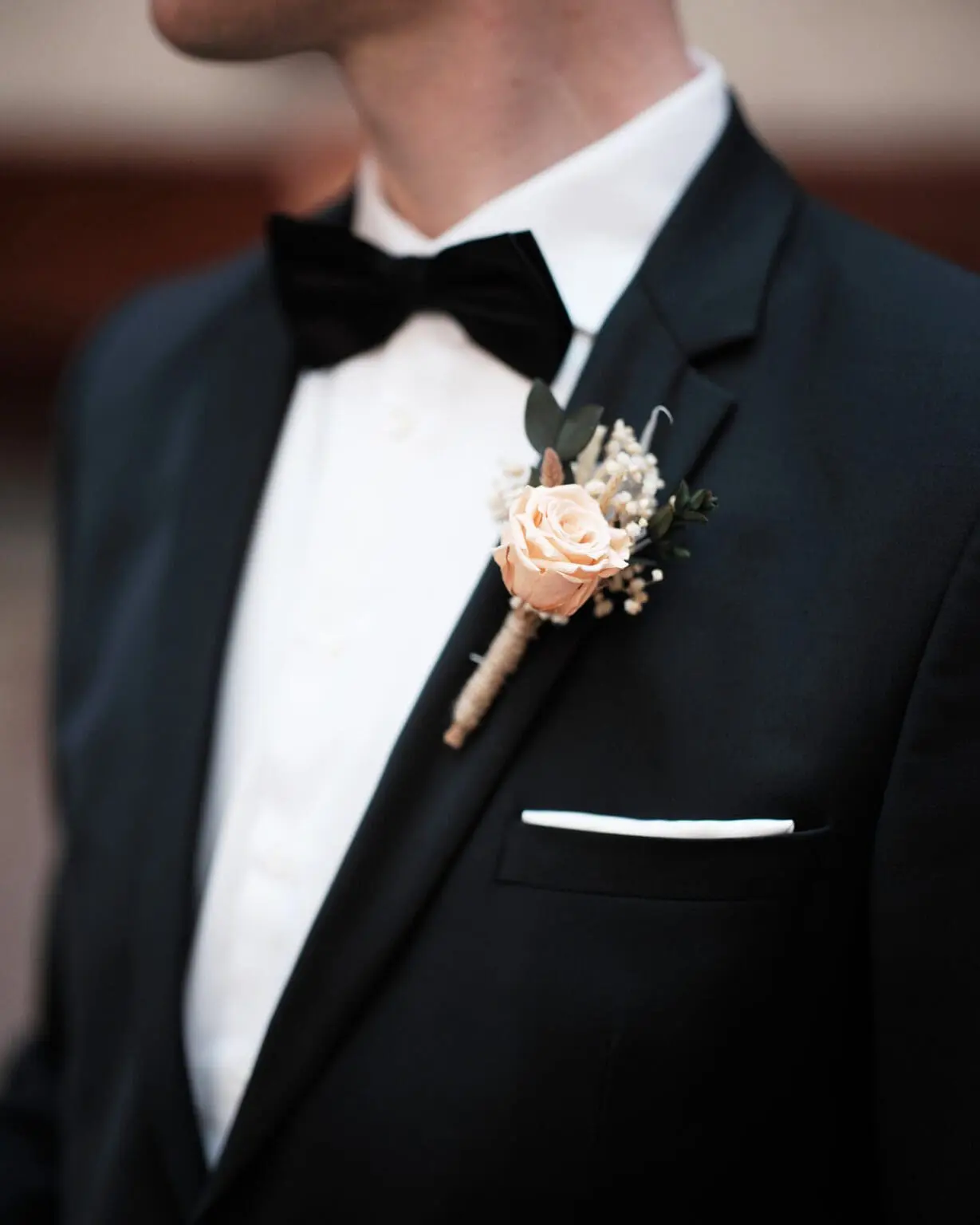 Classy groom's boutonniere detail at Copenhagen City Hall wedding, photographed by Nordic Wedding.