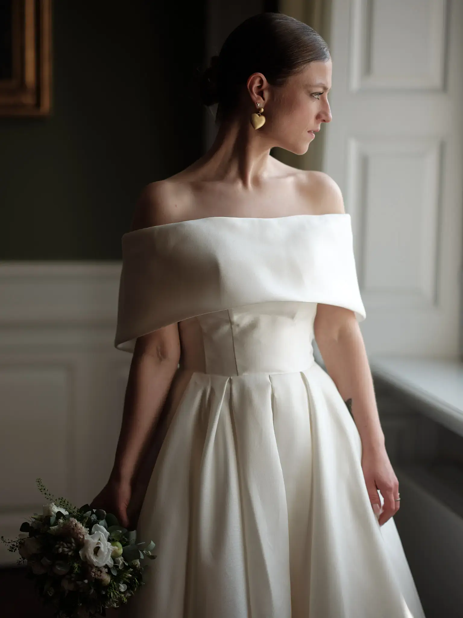 Bridal portrait looking out the window